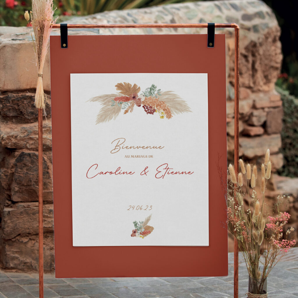 Panneau de bienvenue mariage décoré de fleurs séchées pour une entrée chaleureuse et élégante.